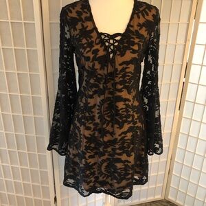 BRONTË stunning lace dress with flesh tone fabric underneath.This is sex…